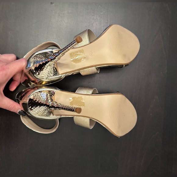 Brand new high heels. Size 8.5. Gold. Velcro adjustable strap. With box. - Picture 2 of 3